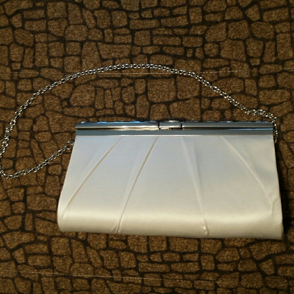Sondra Roberts ivory clutch